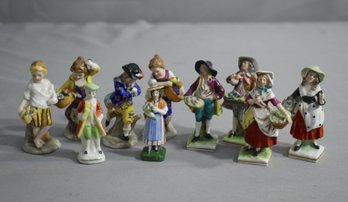 Group Lot Of 10 Porcelain Costumed Women Figurines