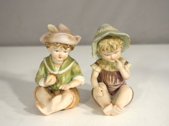 Vintage Bisque Porcelain Figurines  Seated Boy & Girl Pair  4 Tall