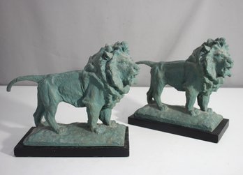 'Pair Of 9 Patinated  Lion Sculptures On Bases'