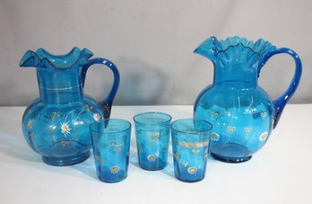 Pair Of Antique Victorian Blue Glass Pitchers & Matching 4' Glasses  Enameled Floral Design