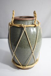 Thai Pottery Jar In Rattan And Bamboo Basket