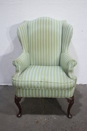Classic Wingback Chair With Striped Upholstery And Carved Legs  Perfect For Restoration