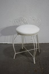 Vintage White Metal Vanity Stool With Scroll Design And Padded Seat