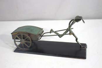 Vintage HAKULI Israel Bronze Man Pulling Lidded Cart - Signed