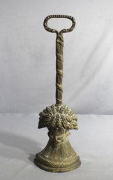 19th Century Grandeur: Antique Brass Doorstop With Ornate Design