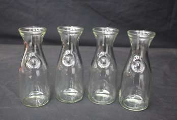 Set Of 4 Vintage 7' Glass Carafes With Embossed Seal