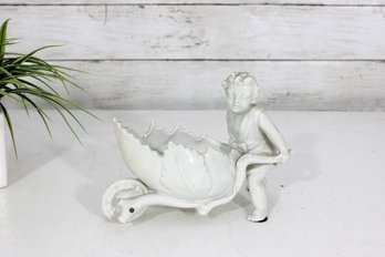 Antique Porcelain Figurine Of A Child With A Wheelbarrow, Circa 1910- 5.5' X 7'