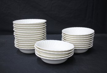 Set Of 7' Round White Porcelain Bowls With Scalloped Edges