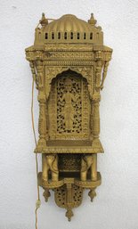 Ornate Wall-Mounted Brass Shrine With Elephant Accents And Intricate Detailing