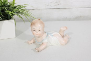 Porcelain Crawling Baby Figurine, 4' X 7'