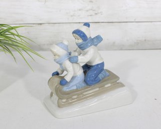 Vintage Paul Sebastian Porcelain Figurine Boy & Girl Sledding 6' Tall
