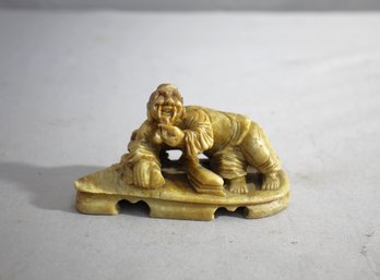 Antique Hand-Carved Figurine - Reclining Elder