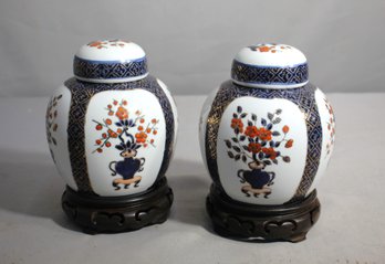 Pair Of YT Decorated Hong Kong Porcelain Lidded Jars On Wooden Bases