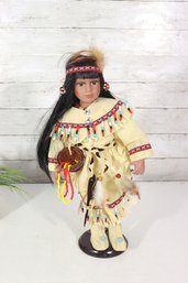 Vintage Porcelain Doll In Native-Inspired Attire  Beaded Dress & Feather Details  17' Tall