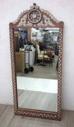 Ornately Carved Vintage Wall Mirror With Decorative Floral And Wheel Motifs