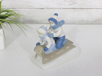 Vintage Paul Sebastian Porcelain Children Sledding Figurine  Mexico Blue & White Winter Toboggan Scene
