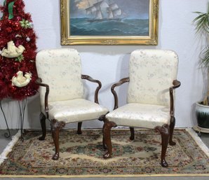 Pair Of Upholstered Armchairs With Carved Mahogany Frames