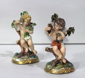 Pair Of Capodimonte Cherub Figurines Representing Spring And Fall - Four Seasons Collection