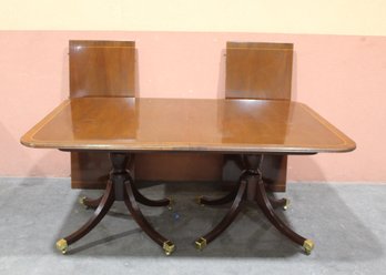 Baker Furniture Double-Pedestal Mahogany Dining Table With Two Leaves