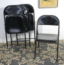 Set Of 4 Vintage Black Metal Folding Chairs  Sturdy And Versatile