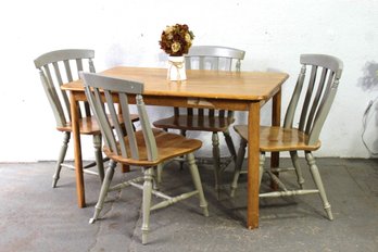 Kitchen Table With  Four Gray Color Chairs