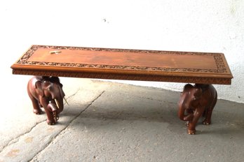 'Ornate Hand-Carved Wood Coffee Table With Elephant Base  Exotic Artisan Elegance'
