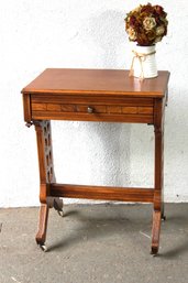 Antique Wooden Table With Decorative Carved Sides And Single Drawer
