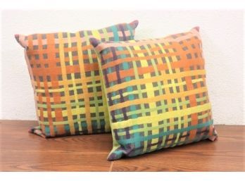 A Pair Of Technicolor Dazzle Plaid Throw Pillows