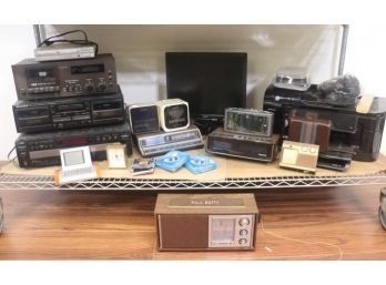 Shelf Lot Of Electronics - Audio/visual, Clocks, Calculators AND Paul Batty's Soundesign TV/Radio...mic Drop.