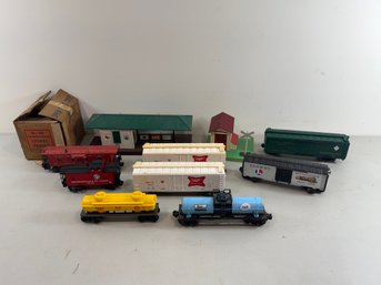 8 Assorted Lionel Train Cars & 2 Buildings