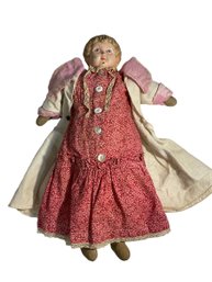 Antique Metal And Enamel Head Doll In Red Dress