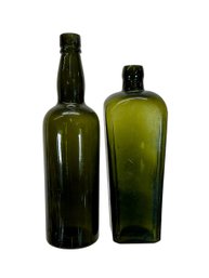 Two Large Green Antique Glass Bottles