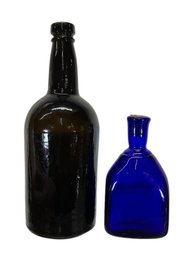 Two Glass Bottles Blue And Brown