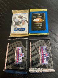 4 Unopened Football Packs Skybox And Proline