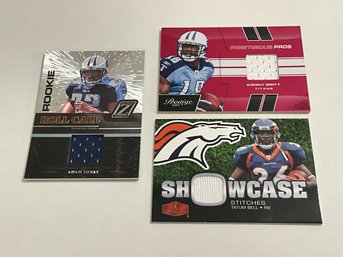 Jersey Cards Of Kenny Britt /250, Tatem Bell And Adam Jones Rookie