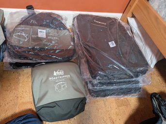 Nine High Quality Duffel Bags.