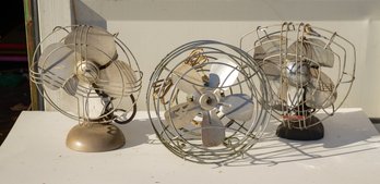Three Vintage Fans.