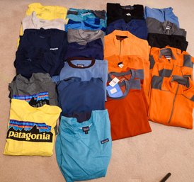 Collection Of Patagonia Fleeces And Lightweight Shirts.