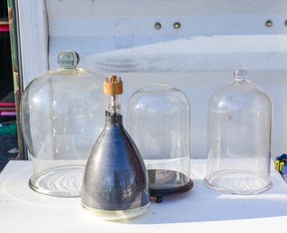 Three Glass Cloche And A Vacuum Tube.