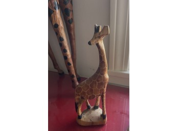 Two Large Paper Mache Giraffes and a Small Wood Giraffe