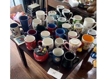 Large Assortment of Ceramic Mugs Including Mickey Mouse and Other Cartoons