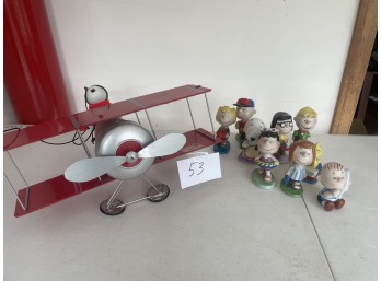 Snoopy Red Baron Airplane with Nine Ceramic Peanuts Figures