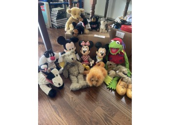 Large Group of Cartoon Stuffed Animals