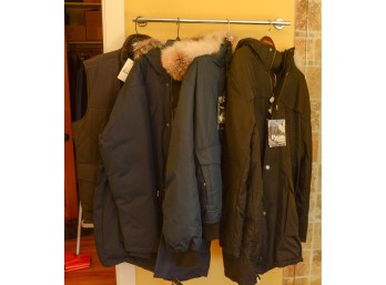 Group of Pajar Parkas and Barbour Vest.