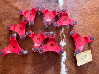 Eight Metal Furniture Movers