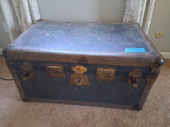 Vintage Floral-Lined Steamer Trunk