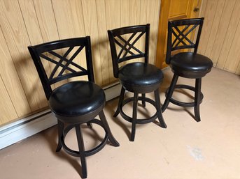 Set Of 3 Black Wooden X-Back Swivel Bar Stools With Cushioned Seats