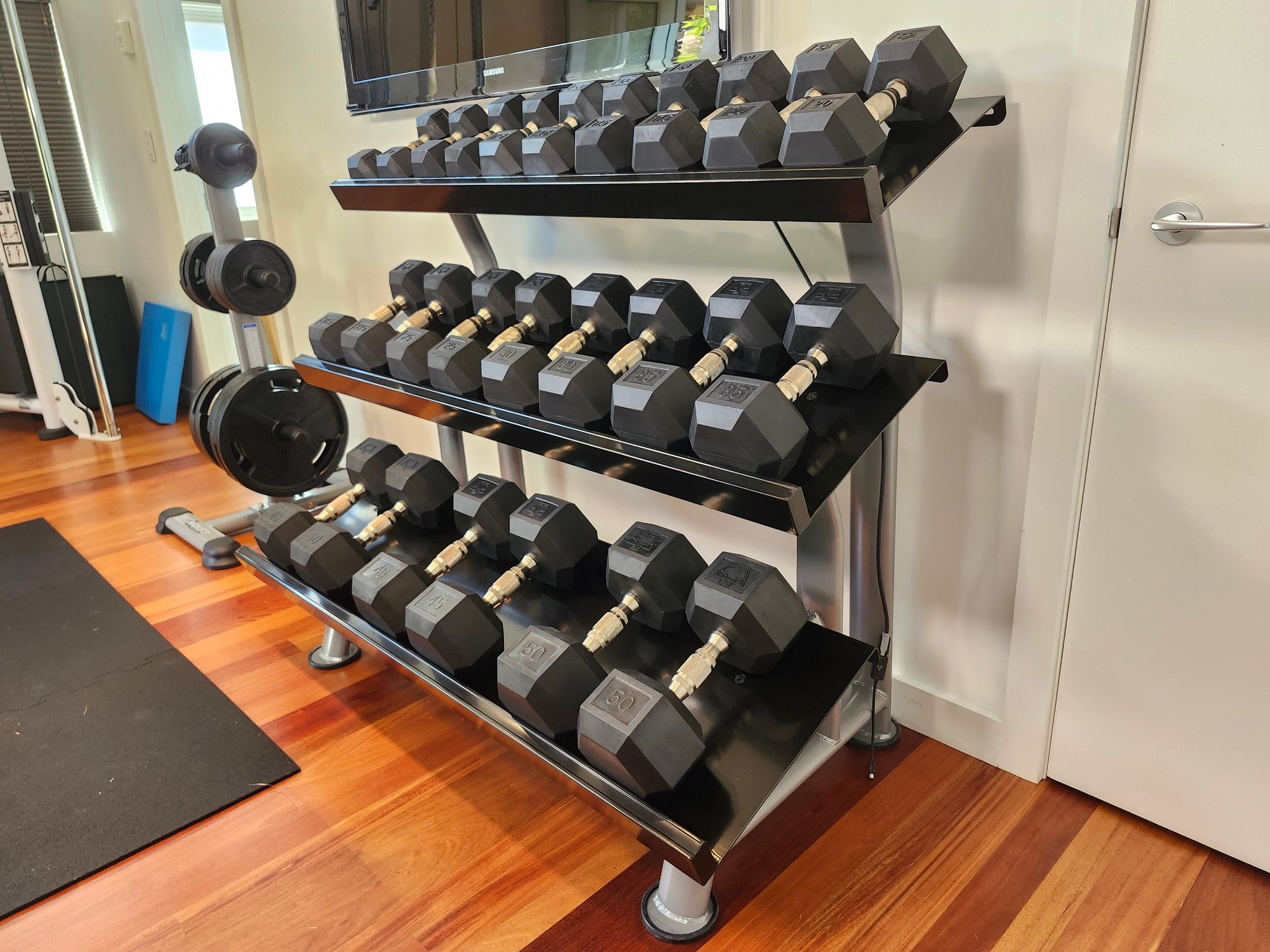 Urethane Dura-Bell Dumbbells - 12 Pair Horizontal Stadium Rack (10-50 ...