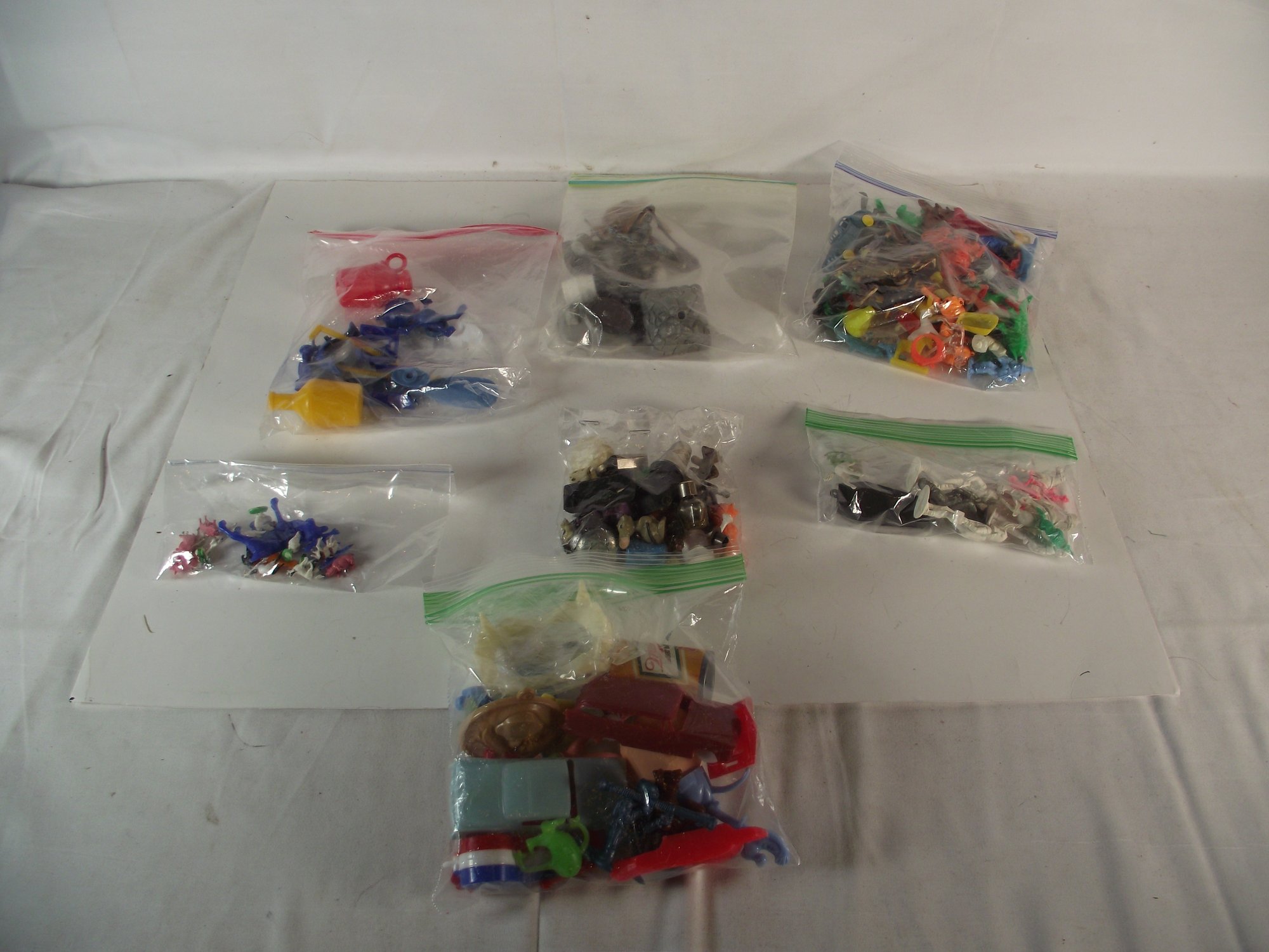 Lot Of Seven (7) Bags Of Plastic Toys #1754047 | Auctionninja.com