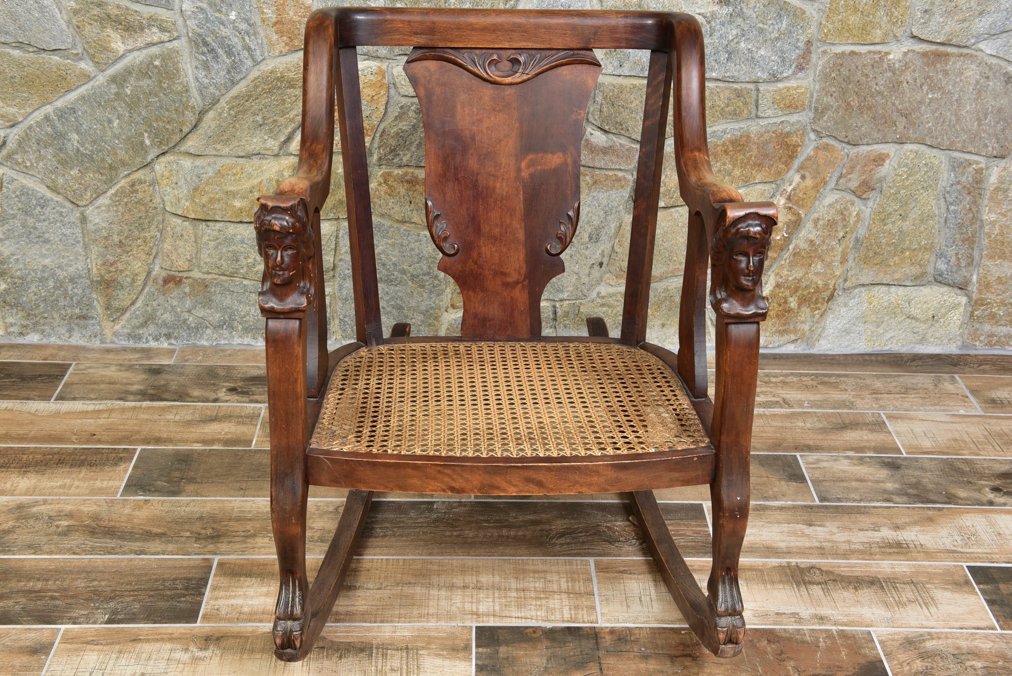 Antique Cane Seat Wooden Rocker With Claw Feet And Figural Arm Rests ...